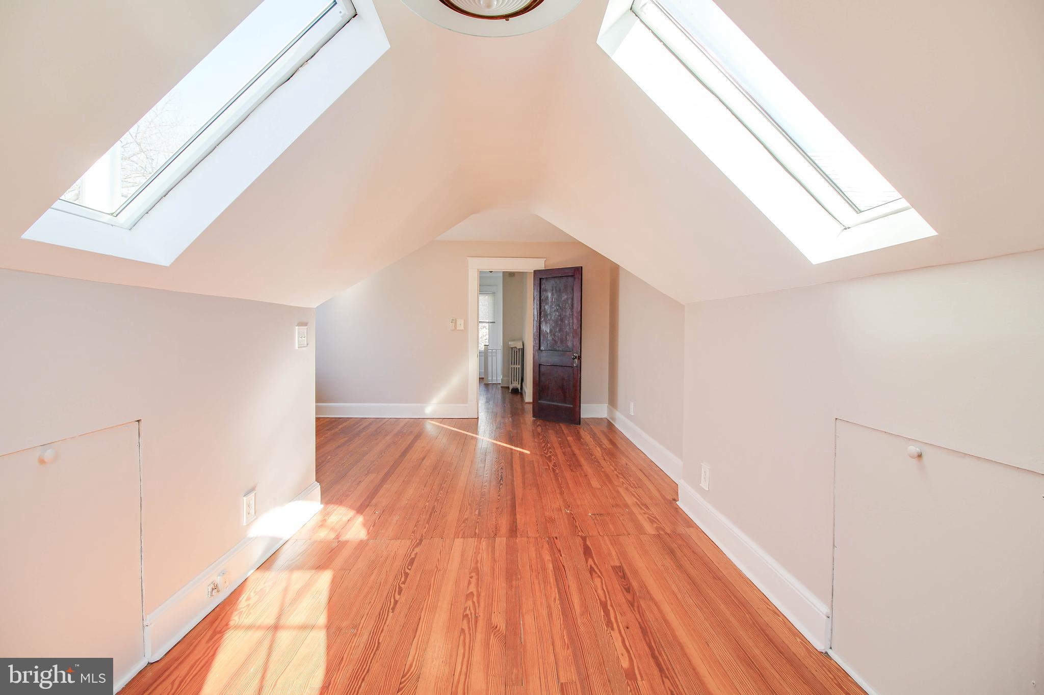 5112 Shelbourne Road Halethorpe, MD 21227 - Photo 28 of 50 upper level 2nd bedroom with skylights