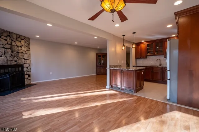 a view of a livingroom with a kitchen