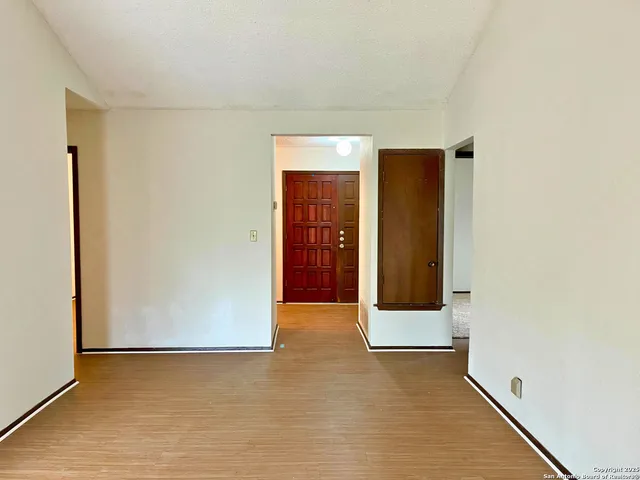 a view of a room with windows