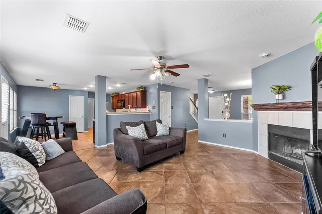 a kitchen with a sink stove and microwave