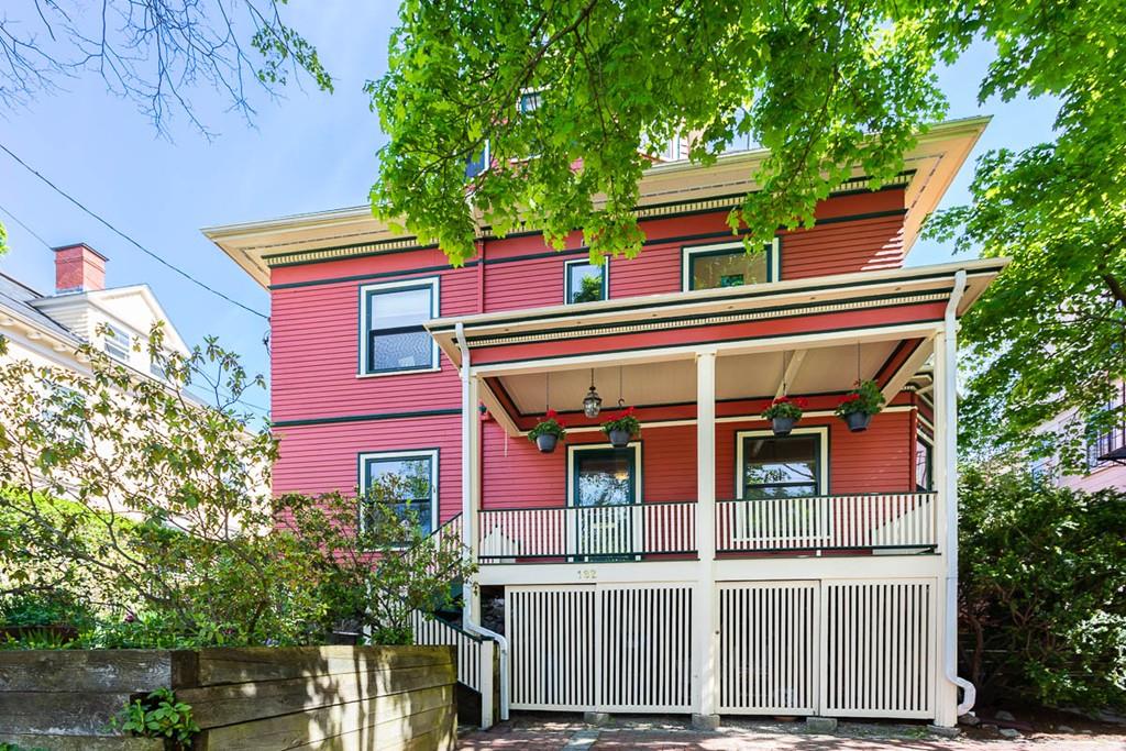 front view of a house with a small yard