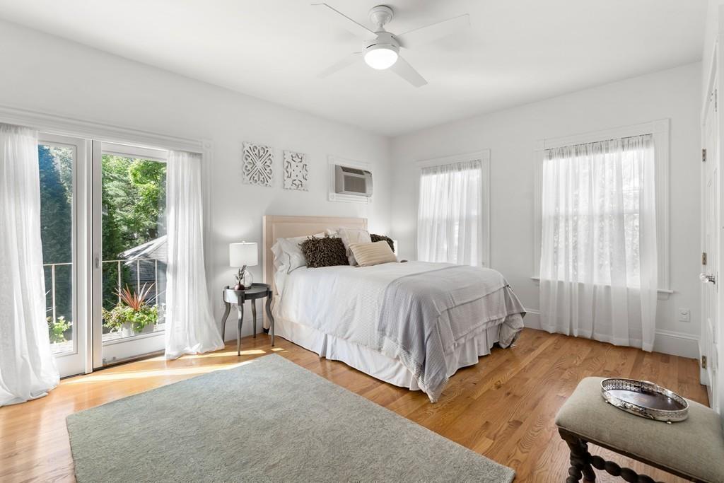 182 Upland Road Cambridge, MA 02140 - Photo 17 of 30 a bedroom with a bed and window
