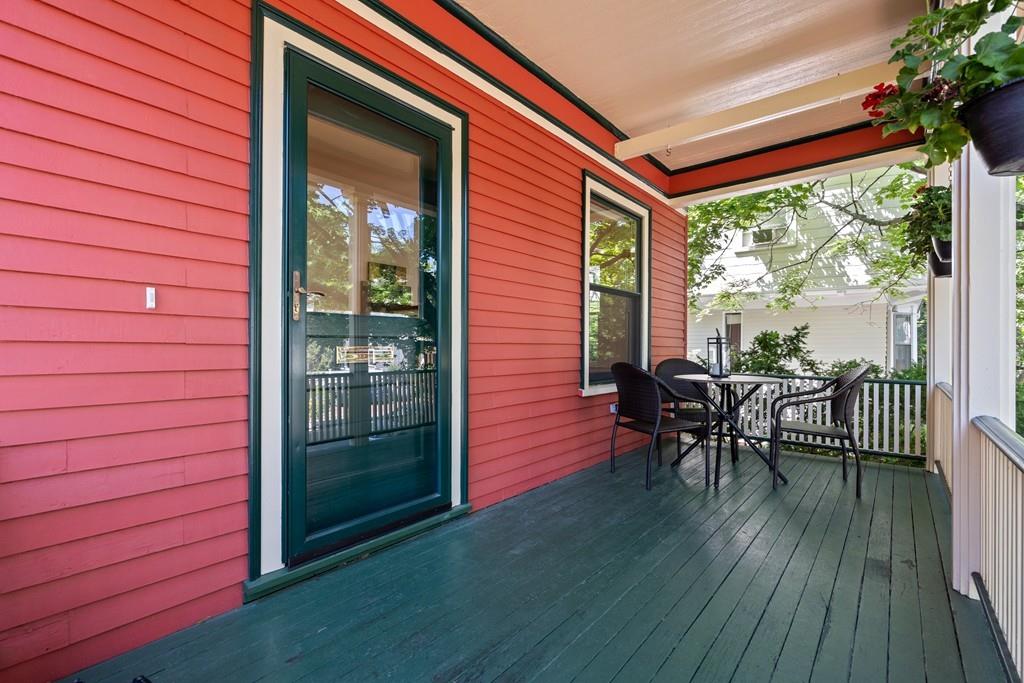 182 Upland Road Cambridge, MA 02140 - Photo 2 of 30 a porch with outdoor seating