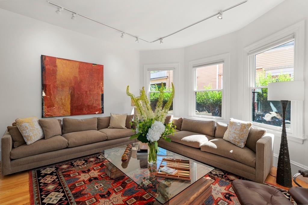 182 Upland Road Cambridge, MA 02140 - Photo 5 of 30 a living room with furniture and a large window