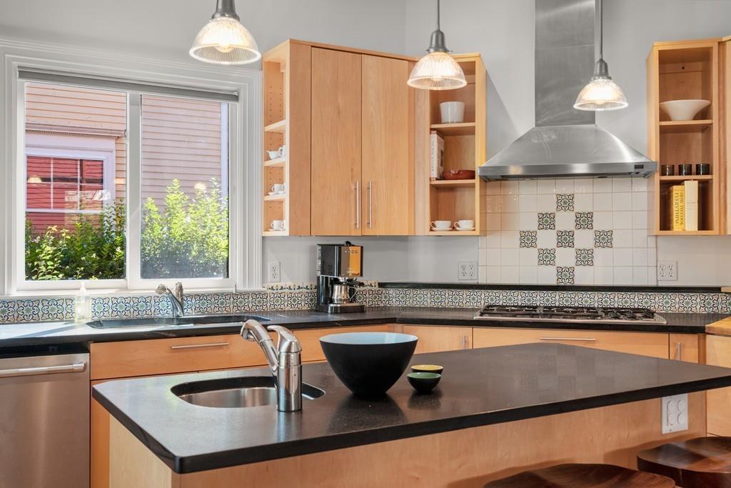 182 Upland Road Cambridge, MA 02140 - Photo 9 of 30 a kitchen with a sink and a window