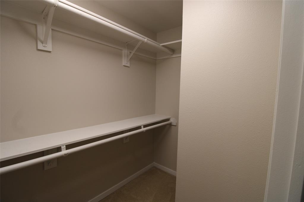 14333 Preston Road, Unit 1304 Dallas, TX 75254 - Photo 29 of 40 a close up view of racks on the wall