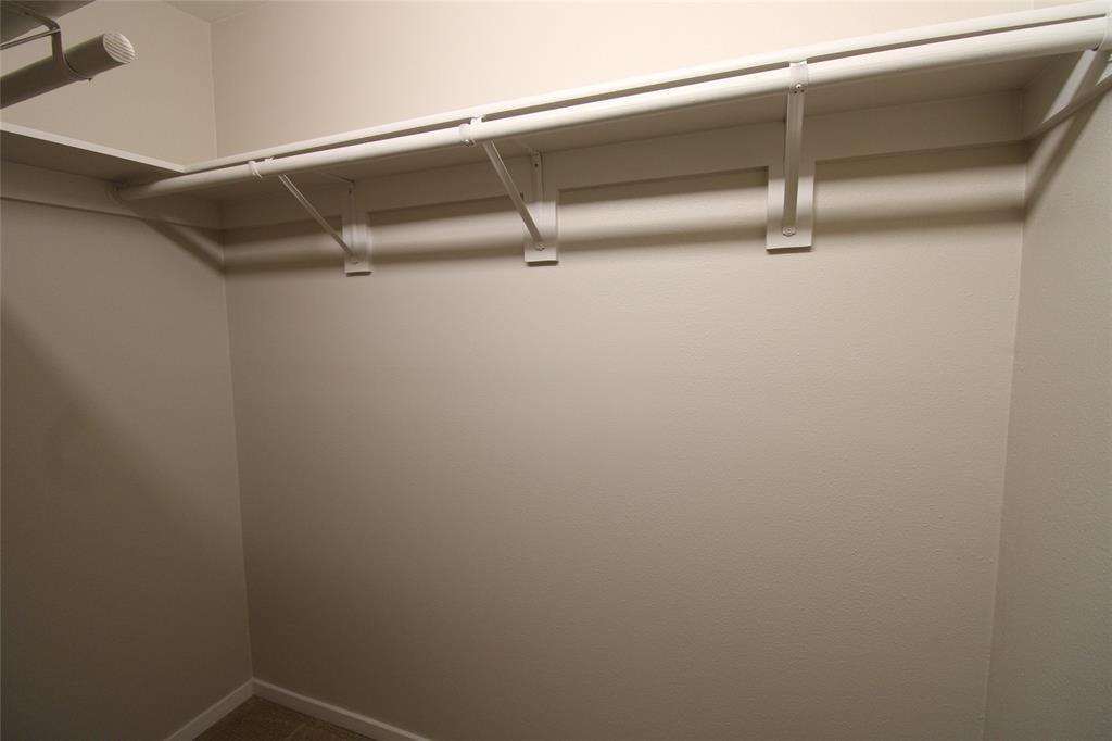 14333 Preston Road, Unit 1304 Dallas, TX 75254 - Photo 31 of 40 a close up view of racks on the wall