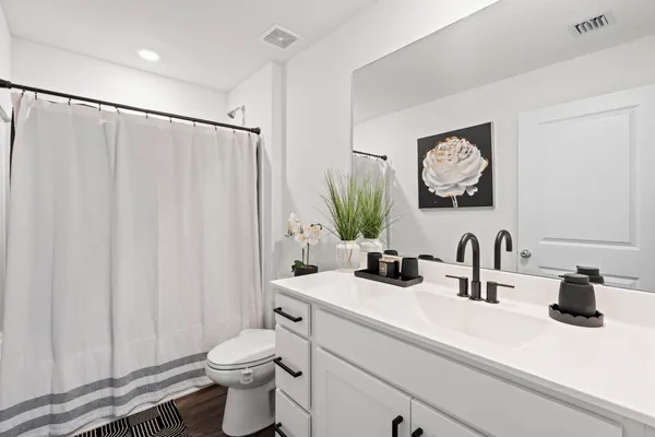 a view of a big house with a big yard