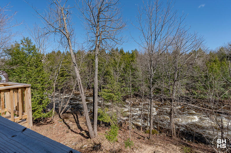 667 Days Mills Road St. Regis Falls, NY 12980 - Photo 11 of 51 HomeOnLakeOzoniaOutlet_Deck_View