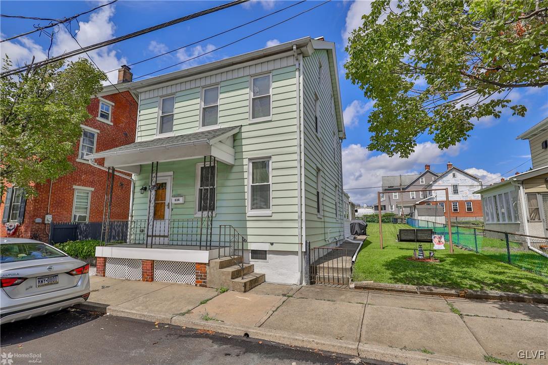 634 Spring Street Bethlehem, PA 18018 - Photo 1 of 48 a front view of a house with a garden