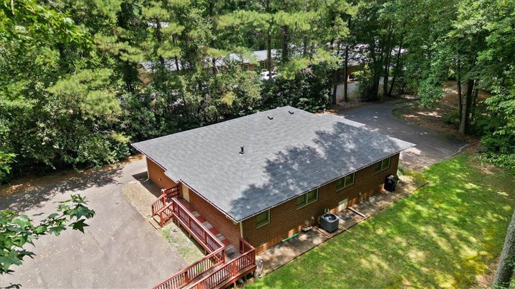 475 Newton Bridge Road Athens, GA 30607 - Photo 14 of 44 a view of a backyard with a tree