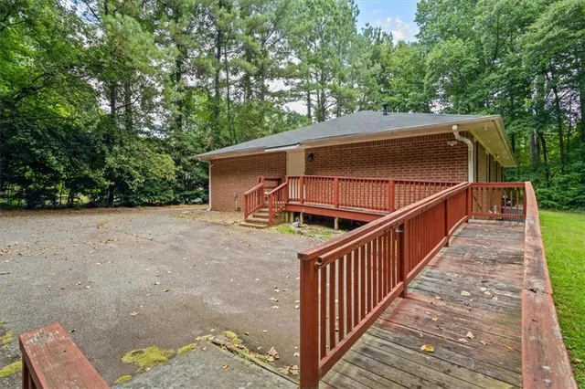 a house with trees in the background