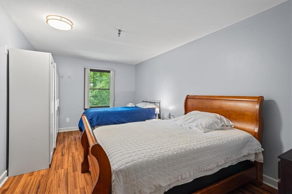 475 Newton Bridge Road Athens, GA 30607 - Photo 24 of 44 a bedroom with a bed and window