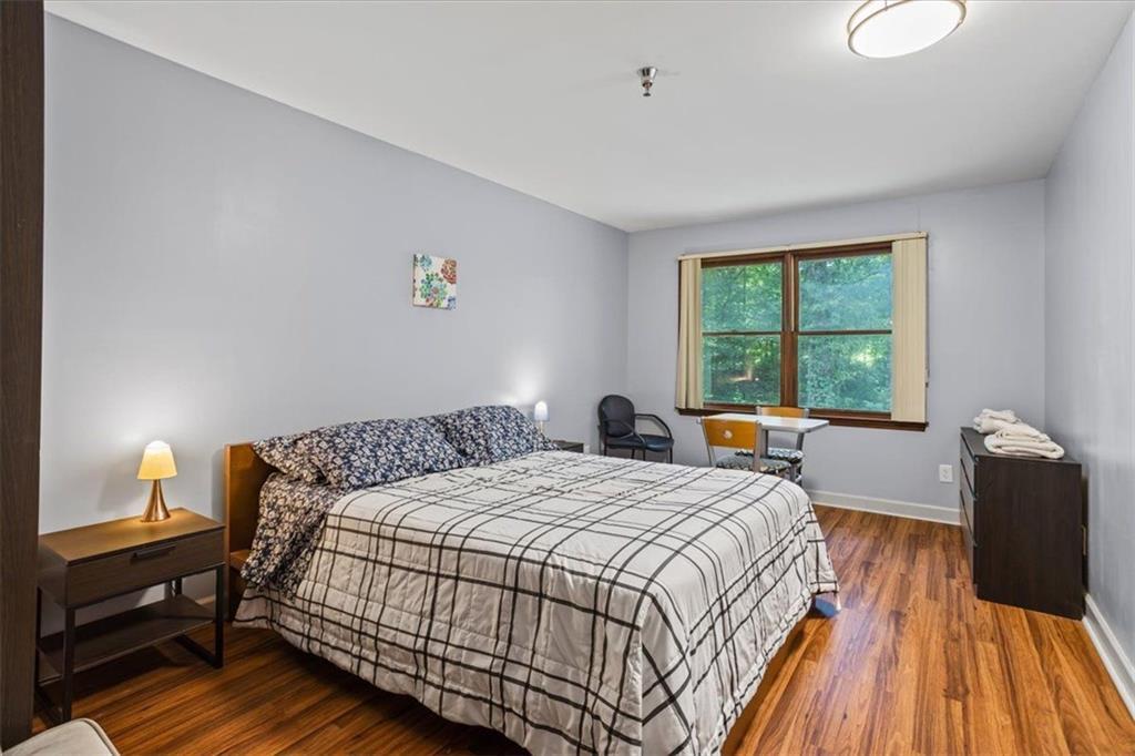 475 Newton Bridge Road Athens, GA 30607 - Photo 26 of 44 a bedroom with a bed and a window