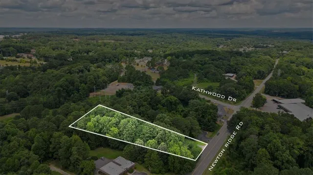 an aerial view of residential house with outdoor space