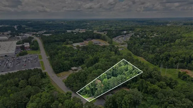 an aerial view of residential house with outdoor space