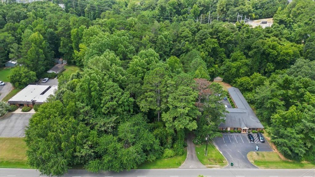 475 Newton Bridge Road Athens, GA 30607 - Photo 8 of 44 an aerial view of residential house with outdoor space and trees all around