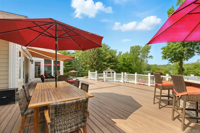 a view of a swimming pool with a patio