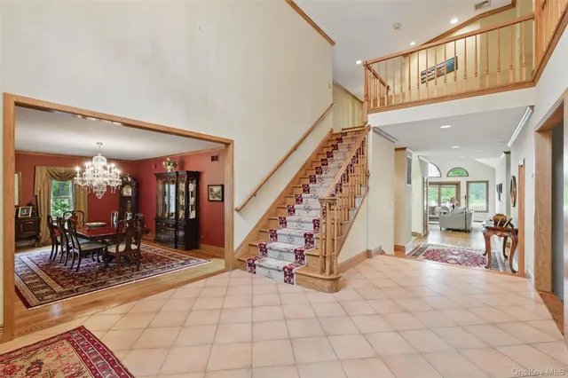 a view of living room with wooden floor and furniture