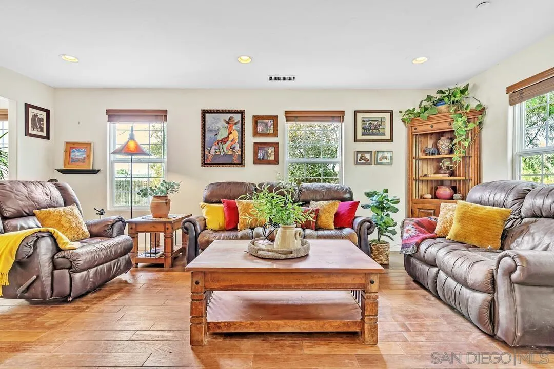 15127 Sycamore Canyon Road Poway, CA 92064 - Photo 12 of 47 a living room with furniture and a large window