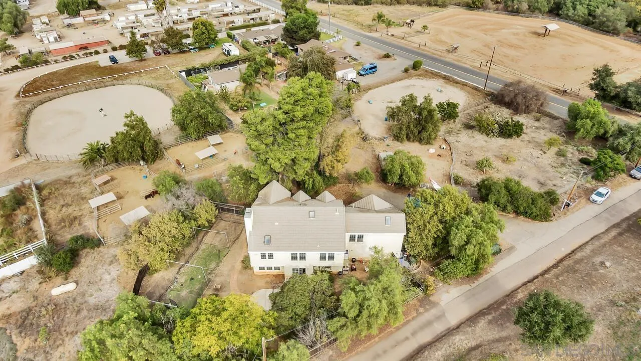 15127 Sycamore Canyon Road Poway, CA 92064 - Photo 2 of 47 an aerial view of residential house with pool and garden