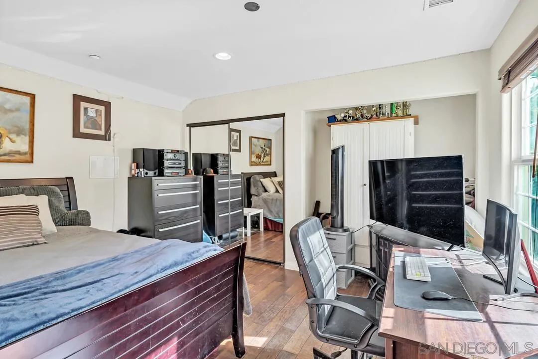 15127 Sycamore Canyon Road Poway, CA 92064 - Photo 30 of 47 a room with furniture and a flat screen tv