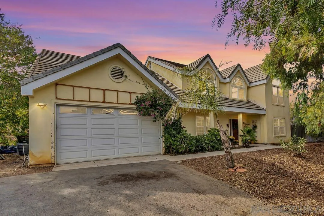 15127 Sycamore Canyon Road Poway, CA 92064 - Photo 3 of 47 a view of a house with a yard and garage