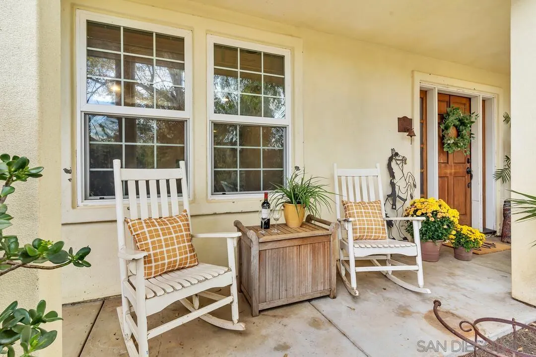 15127 Sycamore Canyon Road Poway, CA 92064 - Photo 6 of 47 a balcony with furniture and potted plants