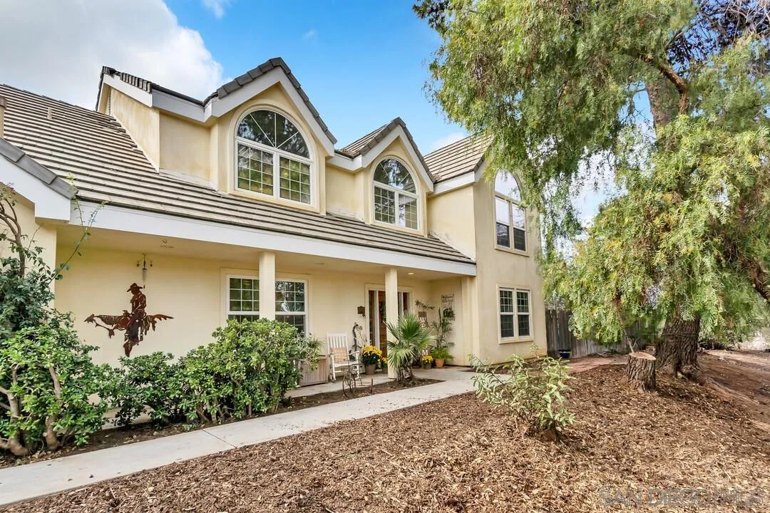 15127 Sycamore Canyon Road Poway, CA 92064 - Photo 7 of 47 a front view of a house with garden
