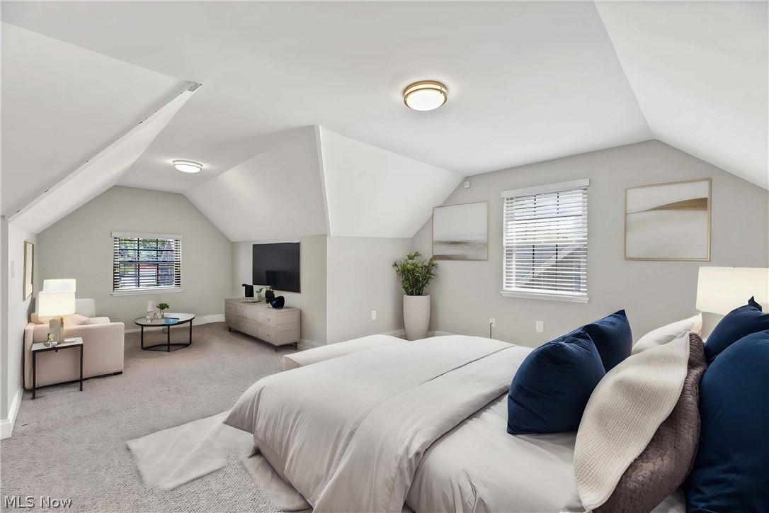 21483 Eaton Road Cleveland, OH 44126 - Photo 21 of 25 Bedroom with light colored carpet and vaulted ceiling