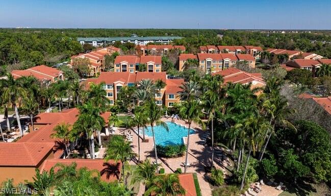 an aerial view of city and lake