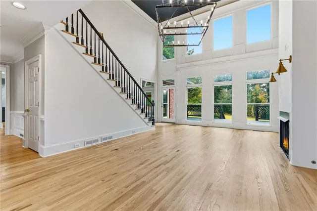 a view of an entryway with wooden floor