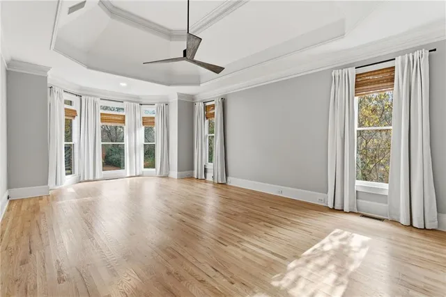 a bathroom with a sink mirror and toilet