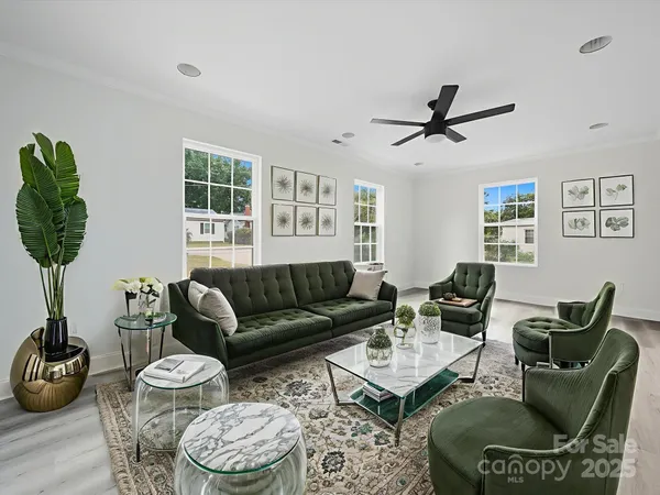 a living room with furniture and a window