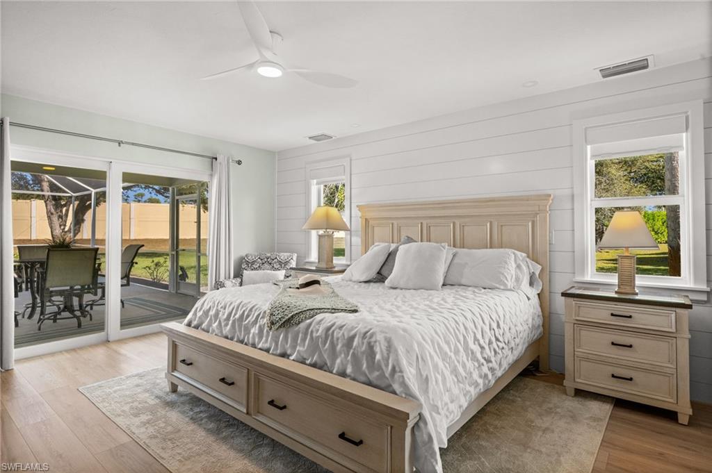 1925 Imperial Golf Course Boulevard Naples, FL 34110 - Photo 21 of 45 A tranquil sanctuary with sliding glass doors to the lanai, perfect for quiet mornings, evening breezes, and effortless indoor-outdoor living.