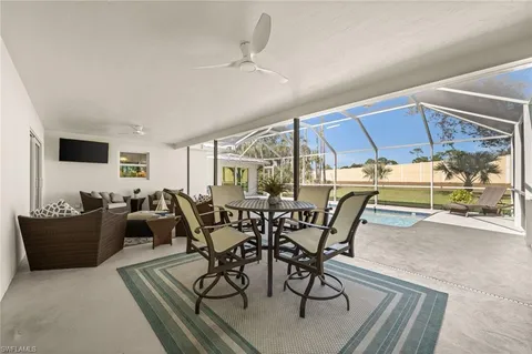 a view of a livingroom with furniture and a table