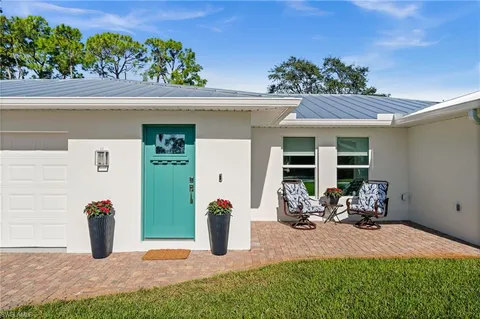 a front view of a house with a patio