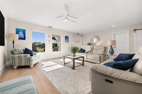 a living room with furniture and a couch