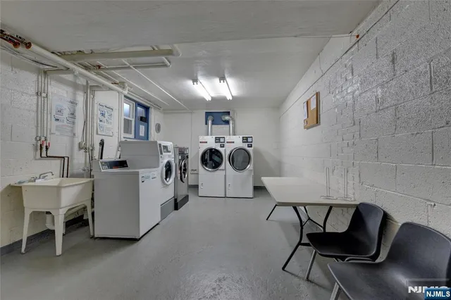 a view of a chairs and a table in a room