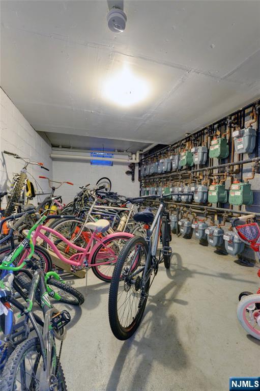 255 Bogert Road, Unit 2A River Edge, NJ 07661 - Photo 18 of 25 a storage with bicycles
