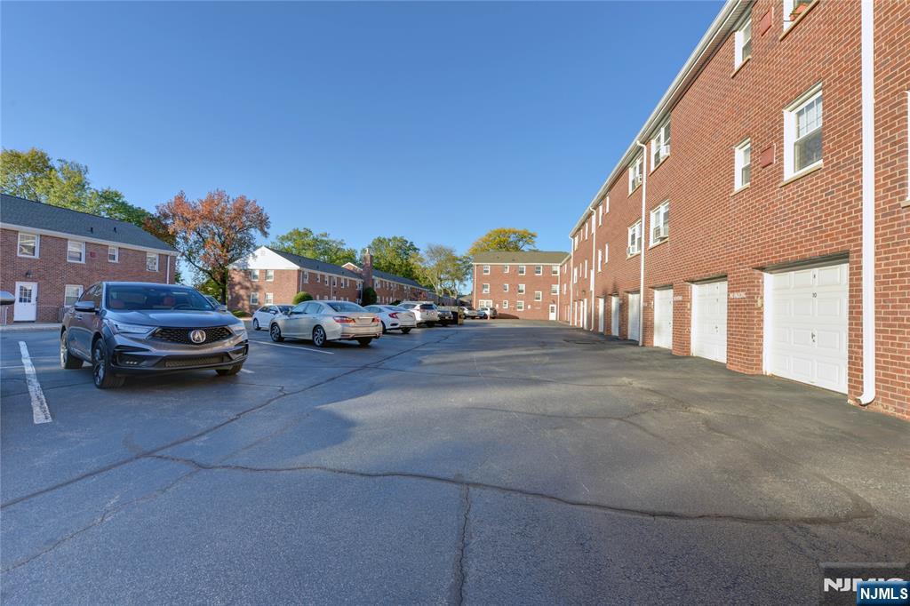 255 Bogert Road, Unit 2A River Edge, NJ 07661 - Photo 20 of 25 a view of street with parked cars