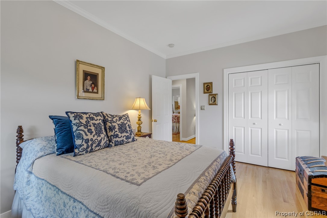 181 Duckbill Road White Stone, VA 22578 - Photo 33 of 50 Hardwood floored bedroom with ornamental molding