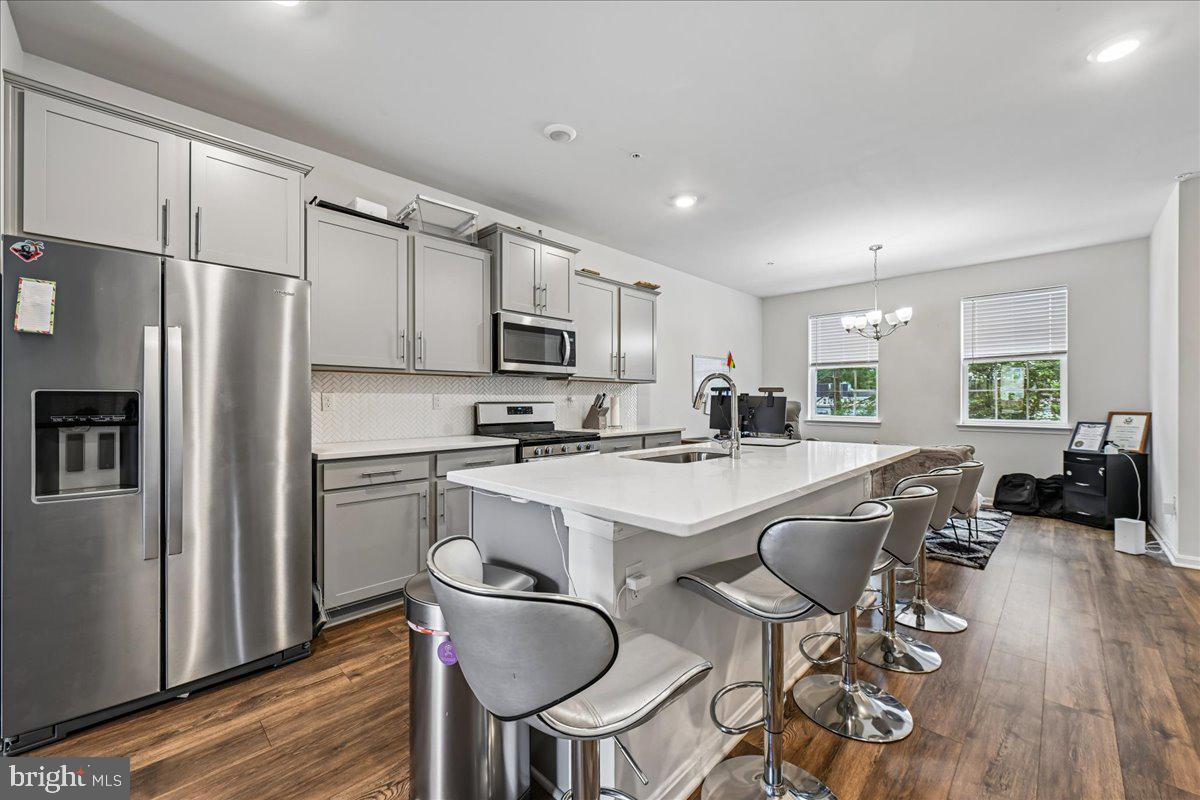 6619 Darter Way Clinton, MD 20735 - Photo 10 of 20 Open Kitchen with Breakfast Bar Seating