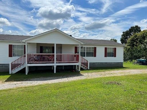 3613 Oak Hill Road Dayton, TN 37321 - Photo 1 of 19 a bedroom with bed and a night stand