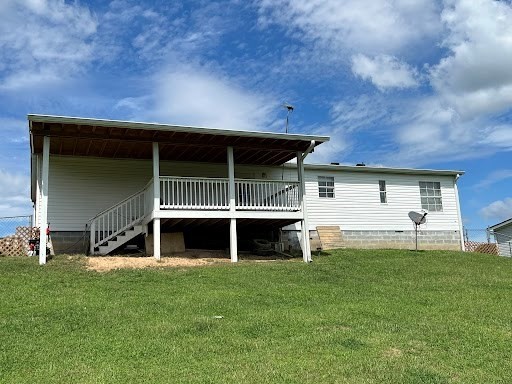 3613 Oak Hill Road Dayton, TN 37321 - Photo 19 of 19 a front view of a house with a yard and a porch