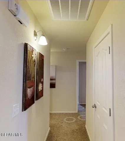 a view of a a dining room with furniture window and wooden floor