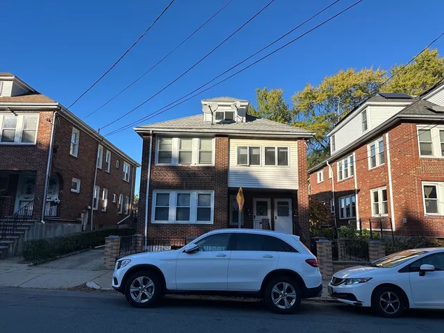 a car parked in front of a building