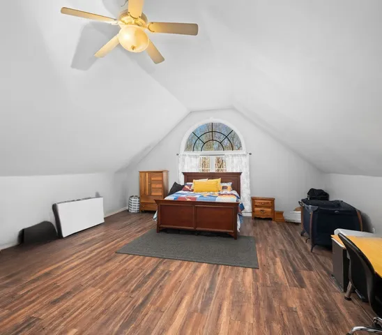 a view of a house with swimming pool and a yard