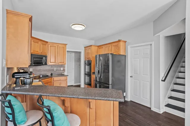 a view of a dining room with furniture