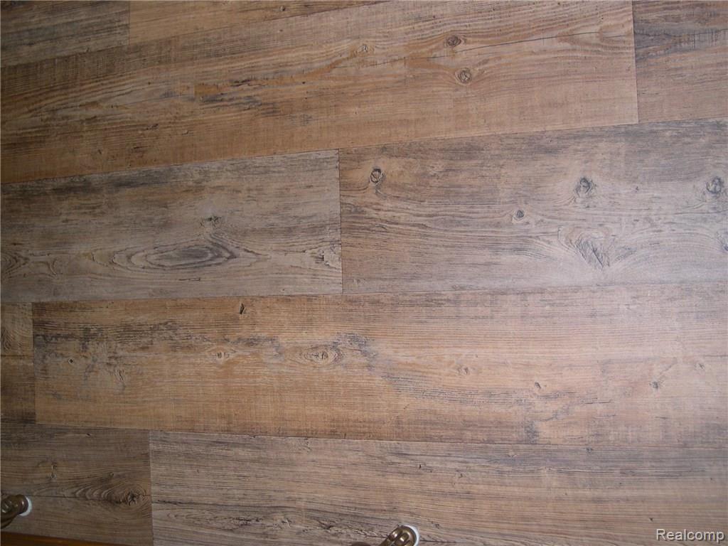 4170 Elevation Lane Howell, MI 48855 - Photo 22 of 36 VINYL FLOORING IN KITCHEN/BREAKFAST ROOM/SUN ROOM